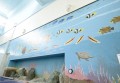 壁面を彩るモザイクタイルは「海底浴場」がテーマ